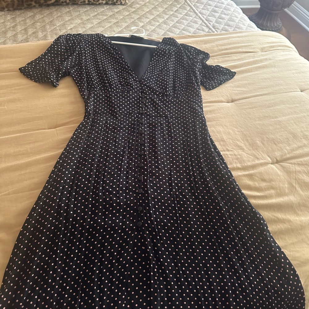 Cleobella’s black with pale pink polka dot dress.